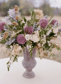 Now, we can talk 'bout purple wedding flowers