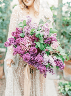 Now, we can talk 'bout purple wedding flowers
